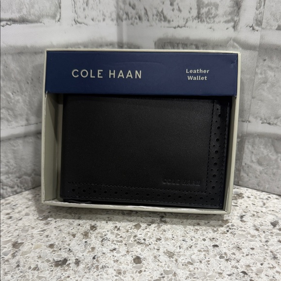 Cole Haan Perforated Black Leather Bifold Wallet - Picture 1 of 4